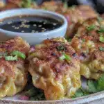 crispy pan-fried pork and ginger potstickers - featured image